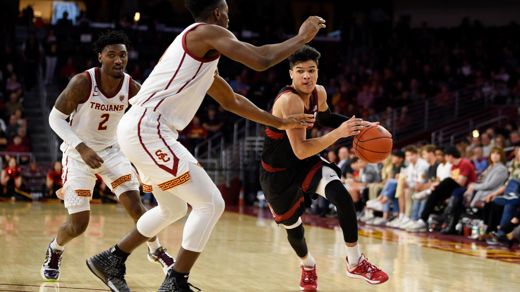 Tyrell Terry dribbling against defender