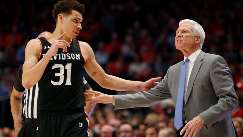 Kellan Grady speaking to coach