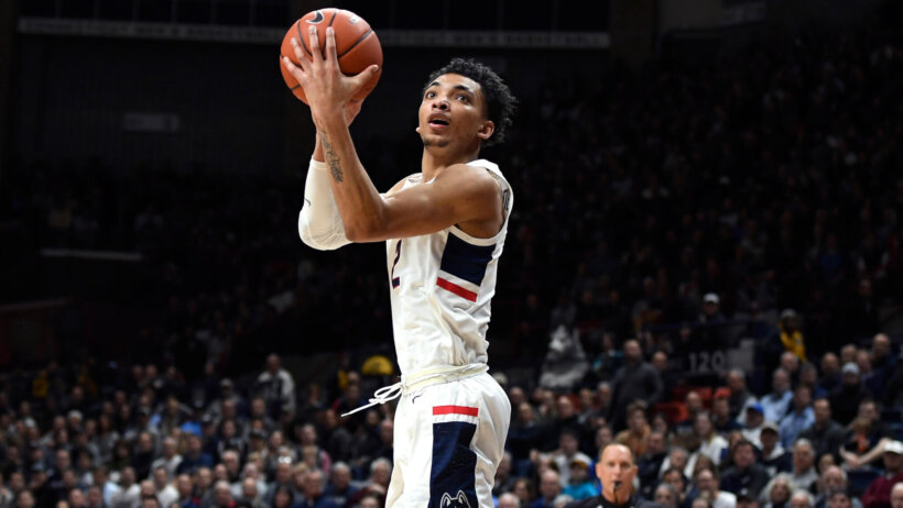 University of Connecticut guard James Bouknight going up for a shot during a game.