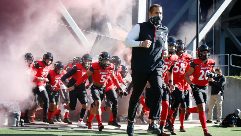 Luke Fickell running