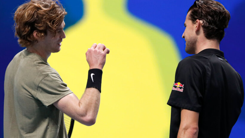 ATP players Andrey Rublev of Russia, left,celebrates defeating Dominic Thiem
