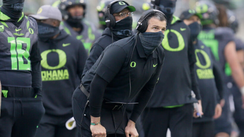 Mario Cristobal watching