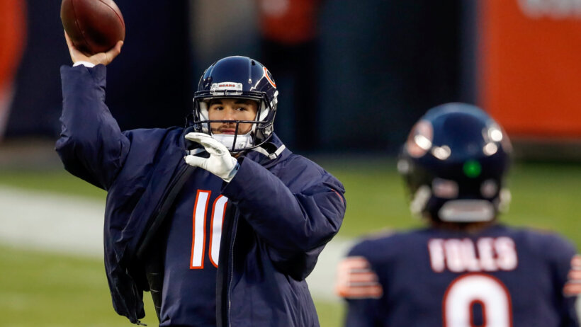 Mitchell Trubisky wearing jacket throwing passes