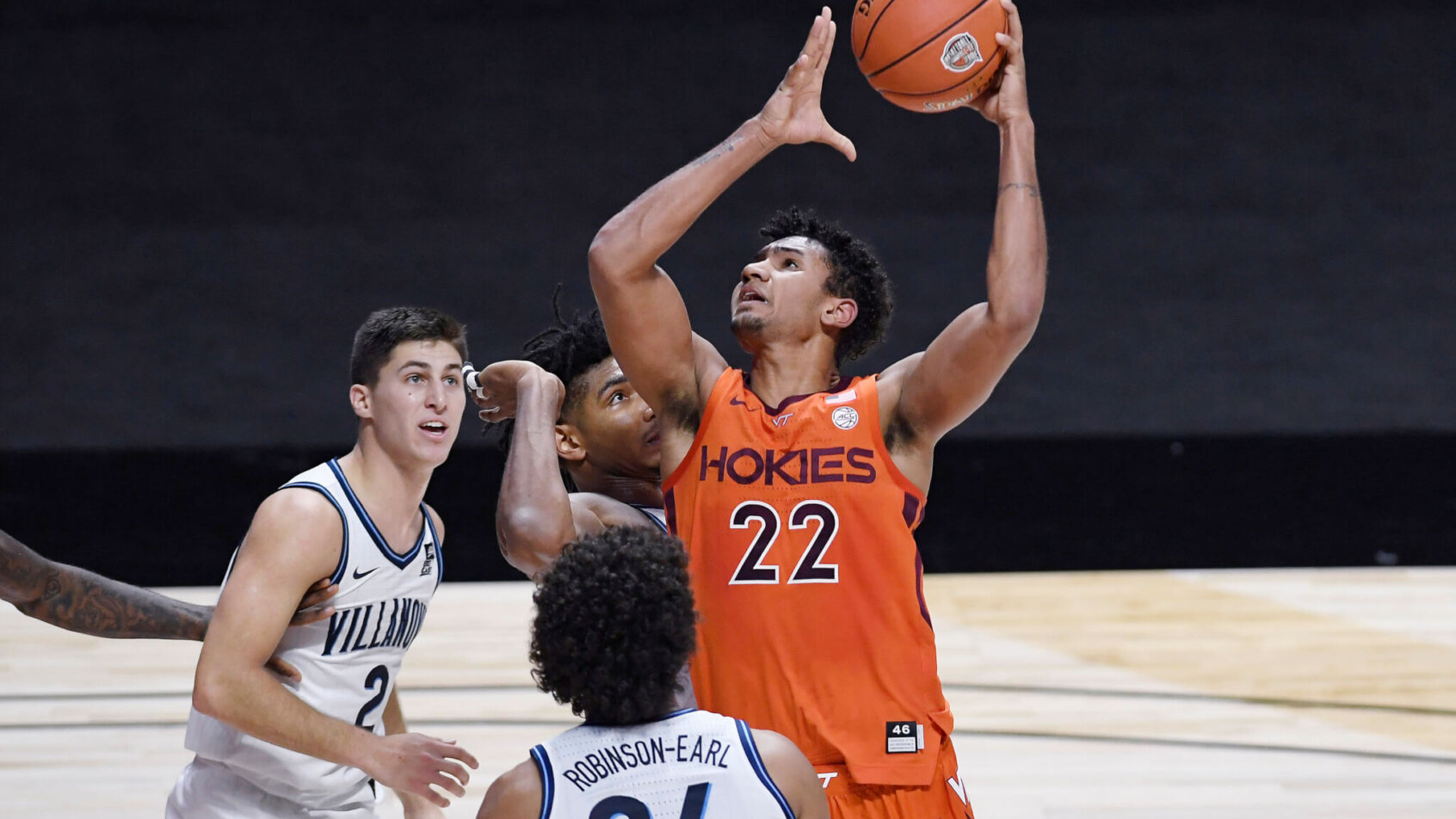 Keve Aluma of Virginia Tech going up for a shot in a game against Villanova.