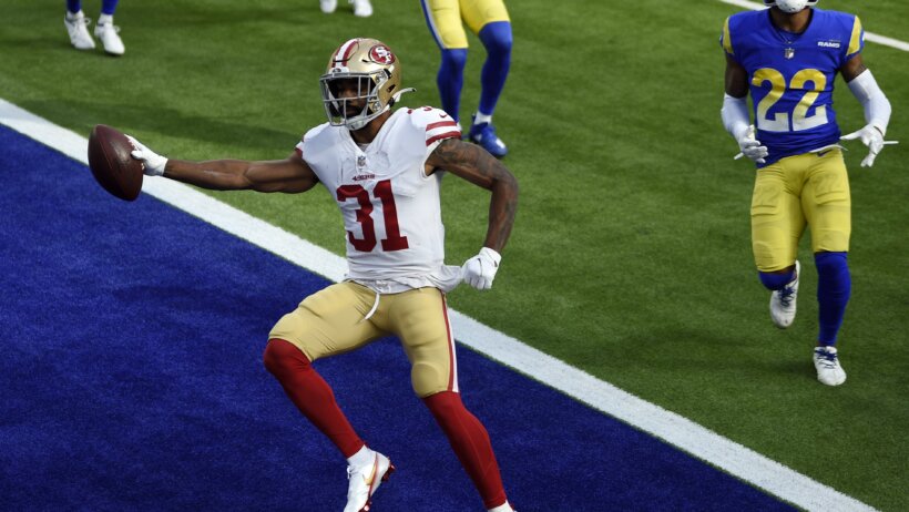 Raheem Mostert celebrating TD score