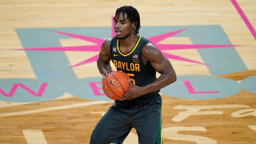 Baylor's Davion Mitchell gets ready to pass