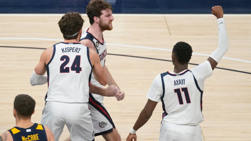 Gonzaga's Drew Timme celebrates with Corey Kispert