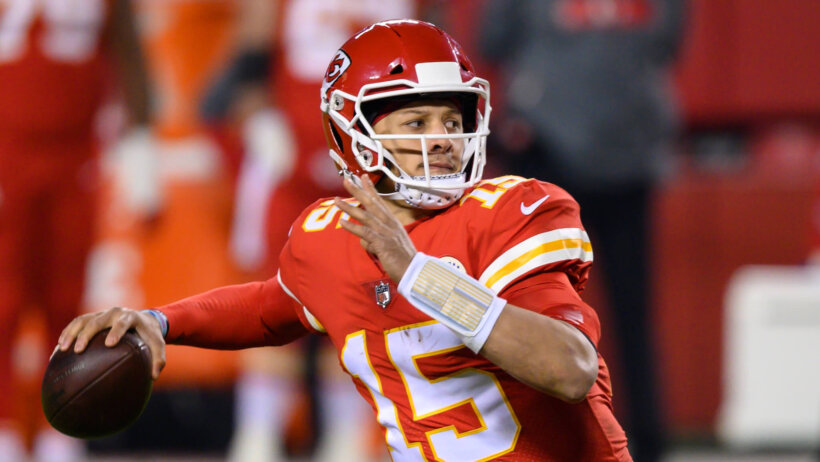 Kansas City Chiefs quarterback Patrick Mahomes throwing a pass during a game.
