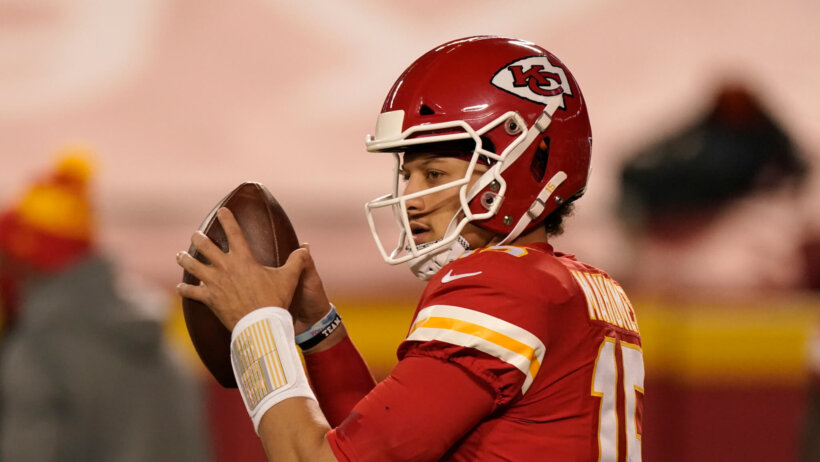 Patrick Mahomes dropping back to pass