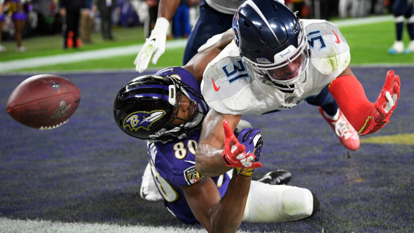 Baltimore Ravens wide receiver Miles Boykin misses a two-point conversion catch in a game with Tennessee Titans free safety Kevin Byard defending.