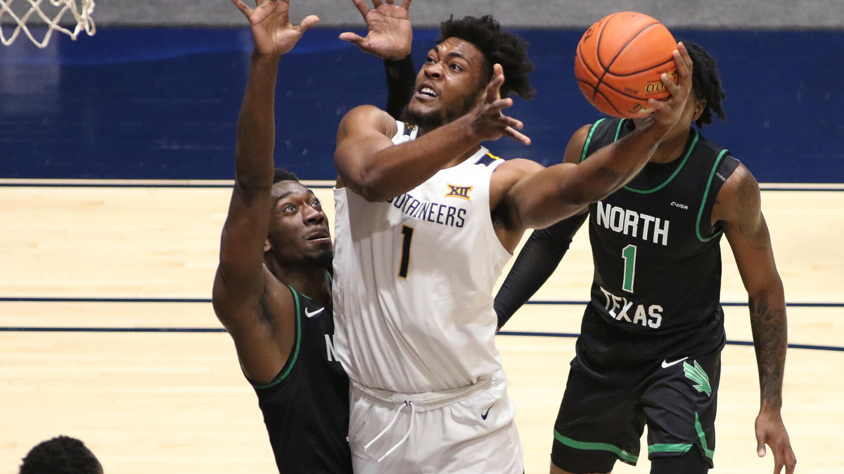 Derek Culver driving for layup
