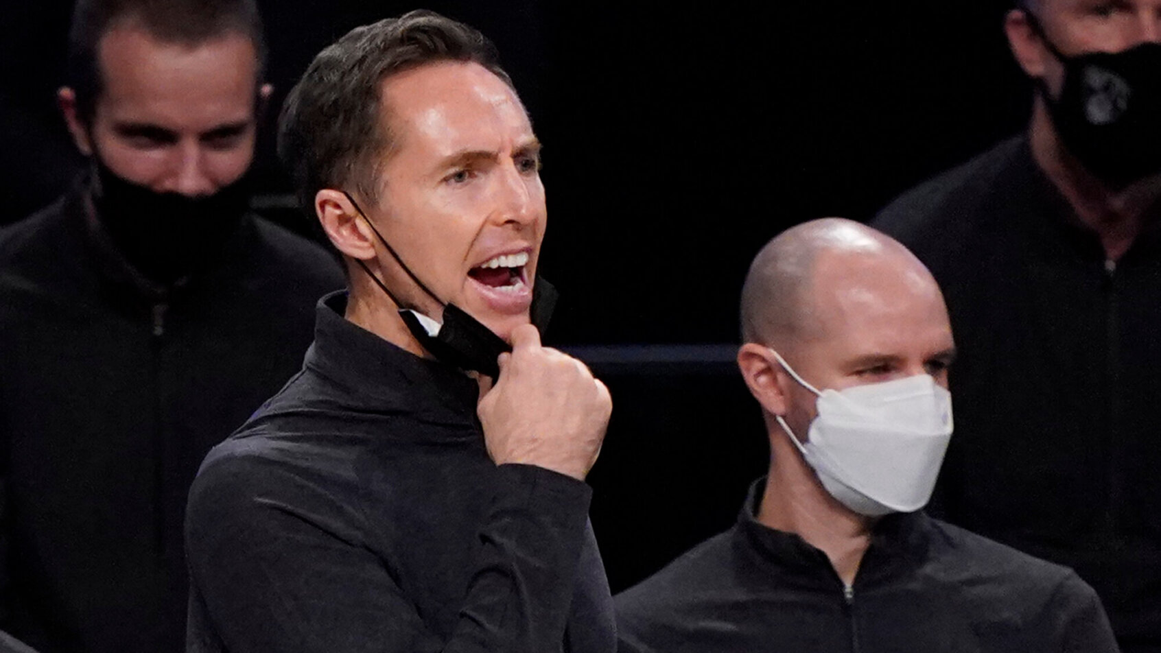 Steve Nash pulls mask down to yell
