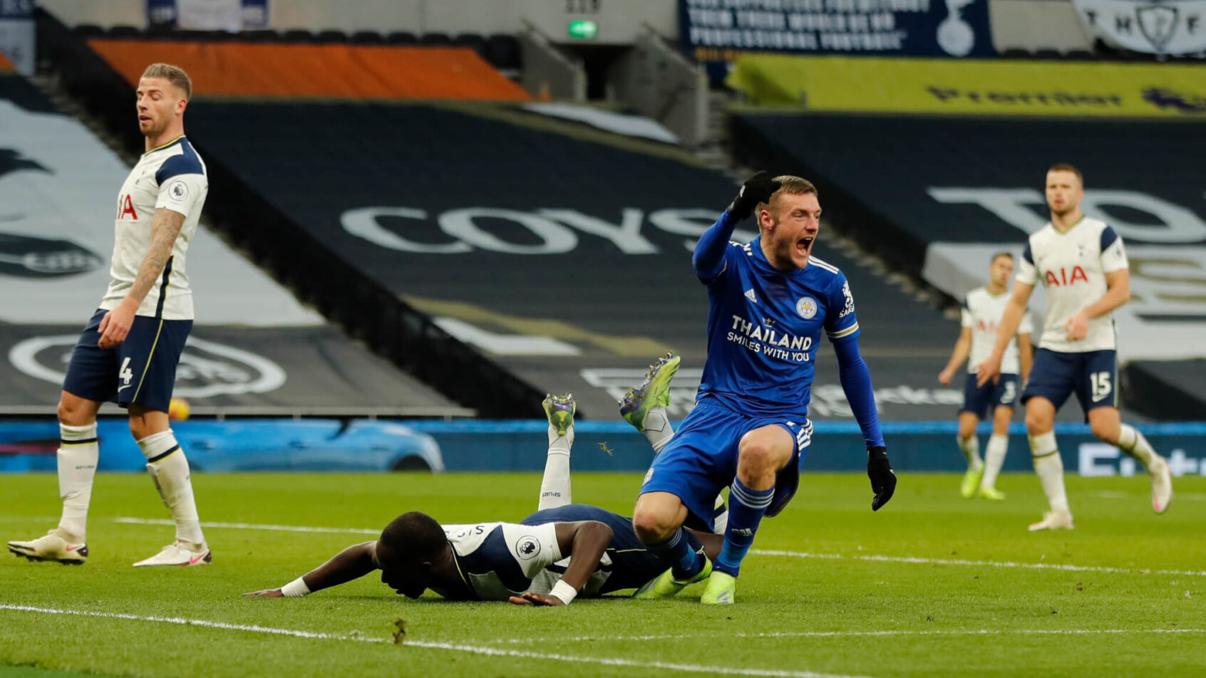 Leicester's Jamie Vardy reacts and celebrates after Tottenham scored on themselves.