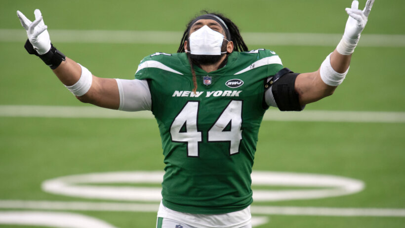 Harvey Langi throws hands in the air to celebrate