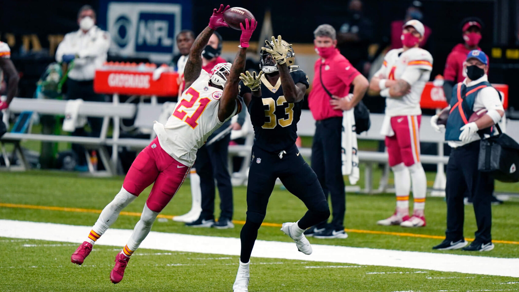 Kansas City Chiefs cornerback Bashaud Breeland breaking up a pass intended for a New Orleans Saints player