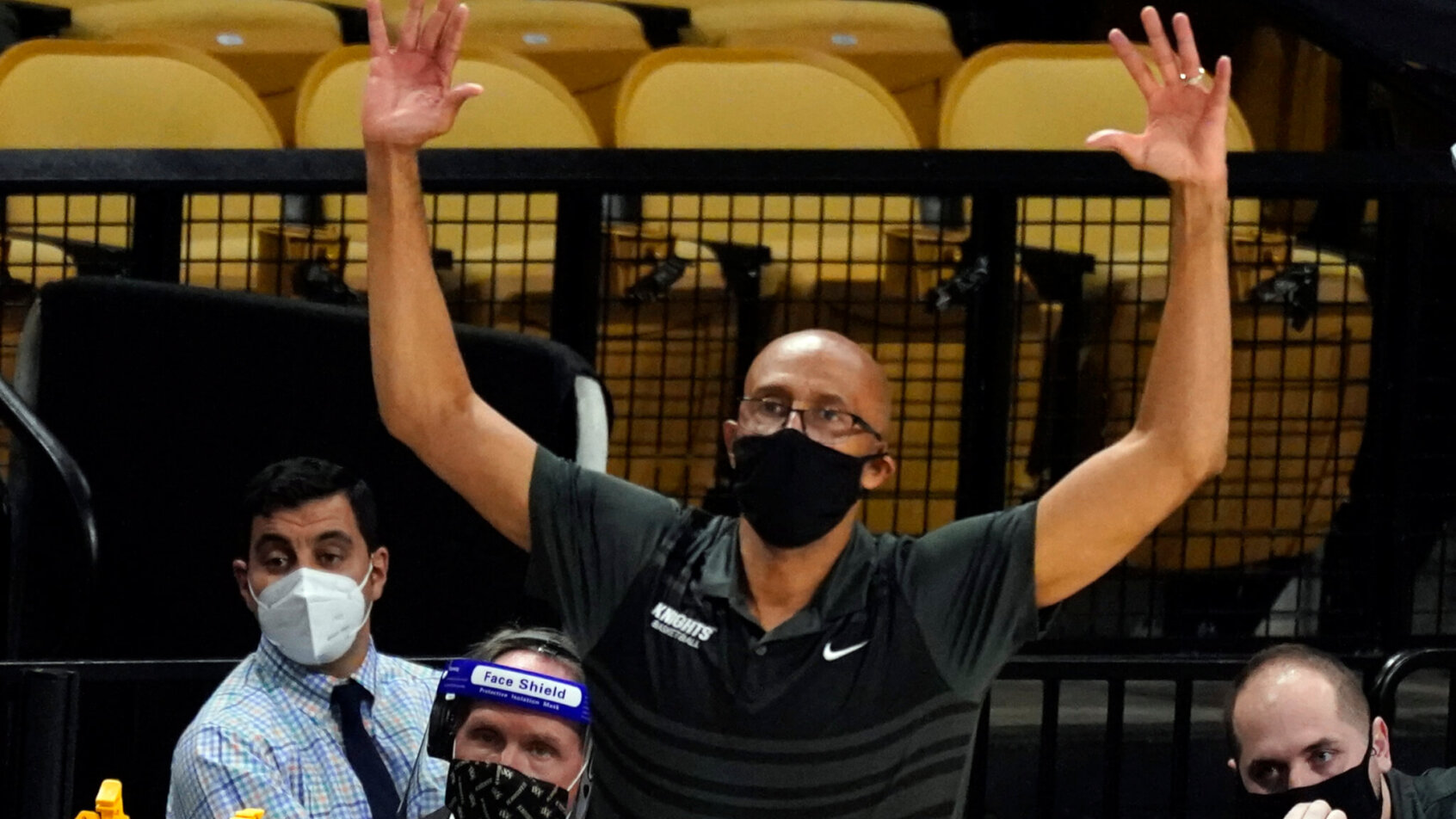 Johnny Dawkins motioning with his hands up