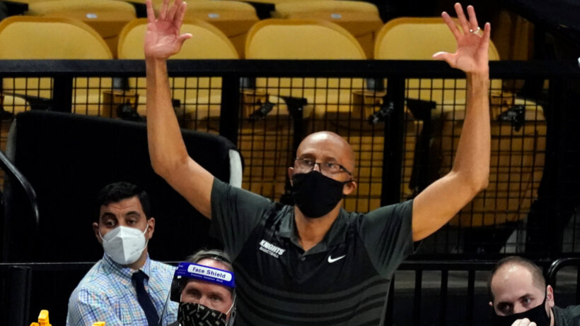 Johnny Dawkins motioning with his hands up