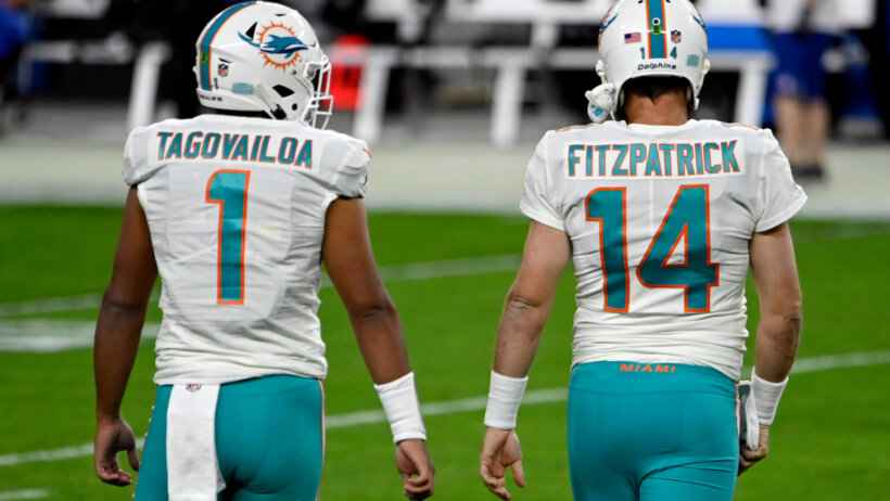 Miami Dolphins quarterbacks Tua Tagovailoa and quarterback Ryan Fitzpatrick