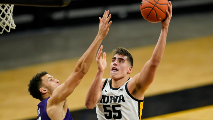 Luka Garza, center, Iowa