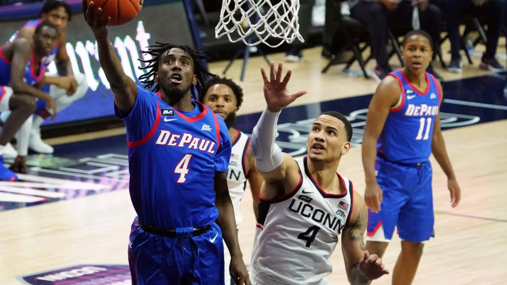 Javon Freeman-Liberty laying in the ball at the basket