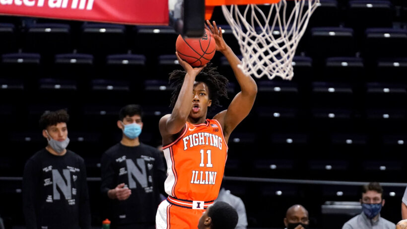 Ayo Dosunmu shooting ball