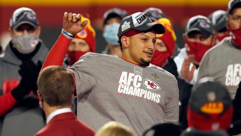 Kansas City Chiefs quarterback Patrick Mahomes celebrating with his teammates after the AFC championship game.