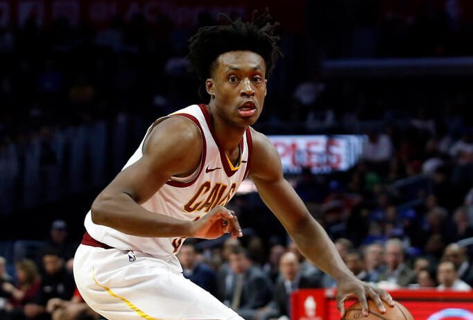 Collin Sexton dribbling ball