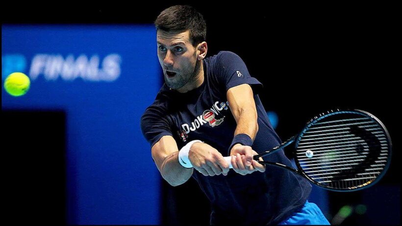 Novak Djokovic about to hit a bkackhand