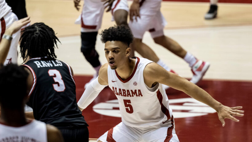 Alabama guard Jaden Shackelford defending against Western Kentucky