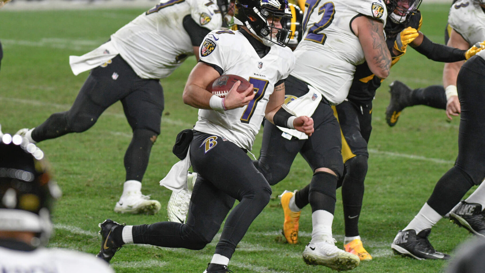 Baltimore Ravens quarterback Trace McSorley about to slide