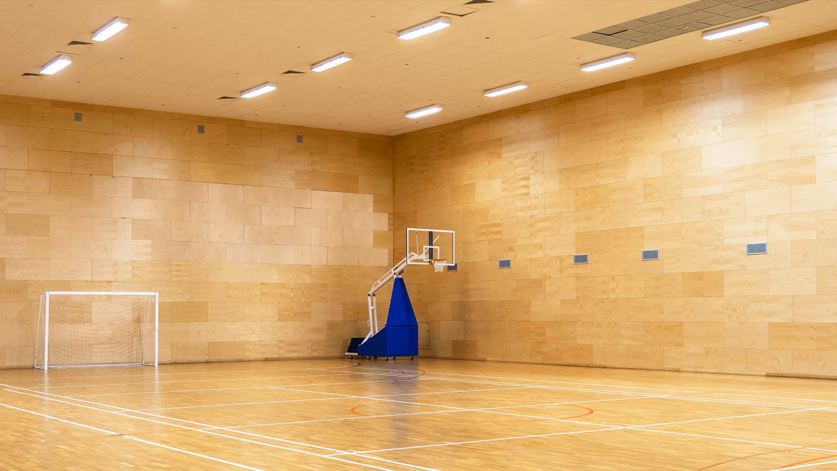 Basketball net in an empty gym