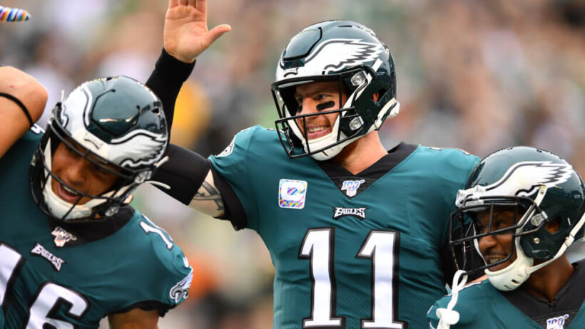 Carson Wentz celebrating with teammates