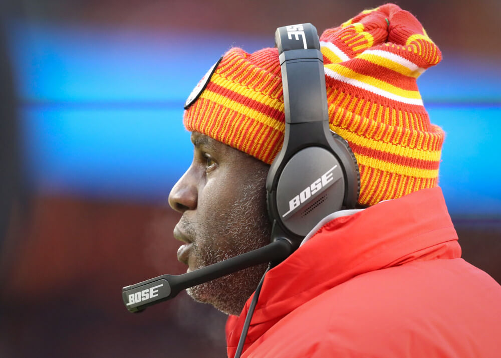Eric Bieniemy with the headset on