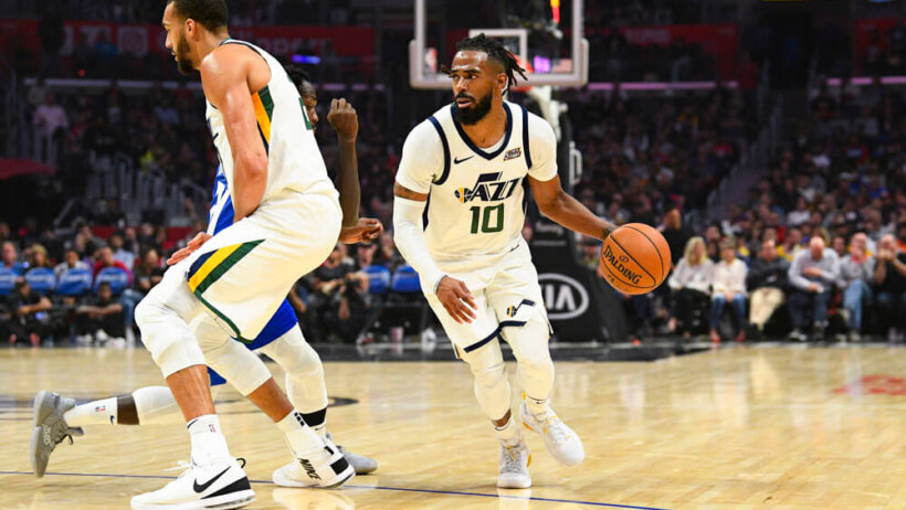 Mike Conley dribbling around screen