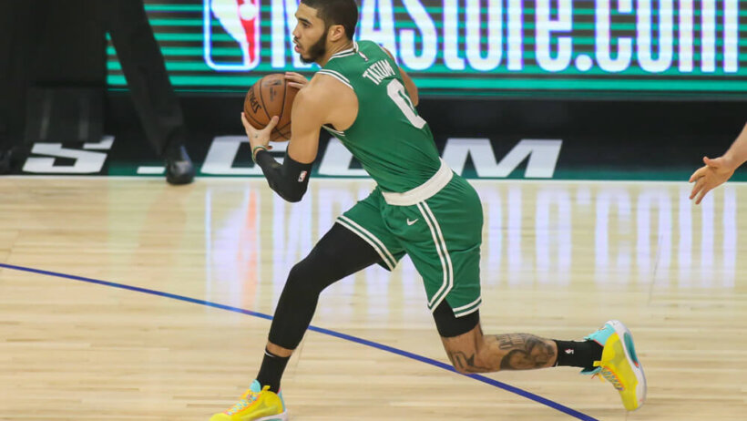 Jayson Tatum holding basketball