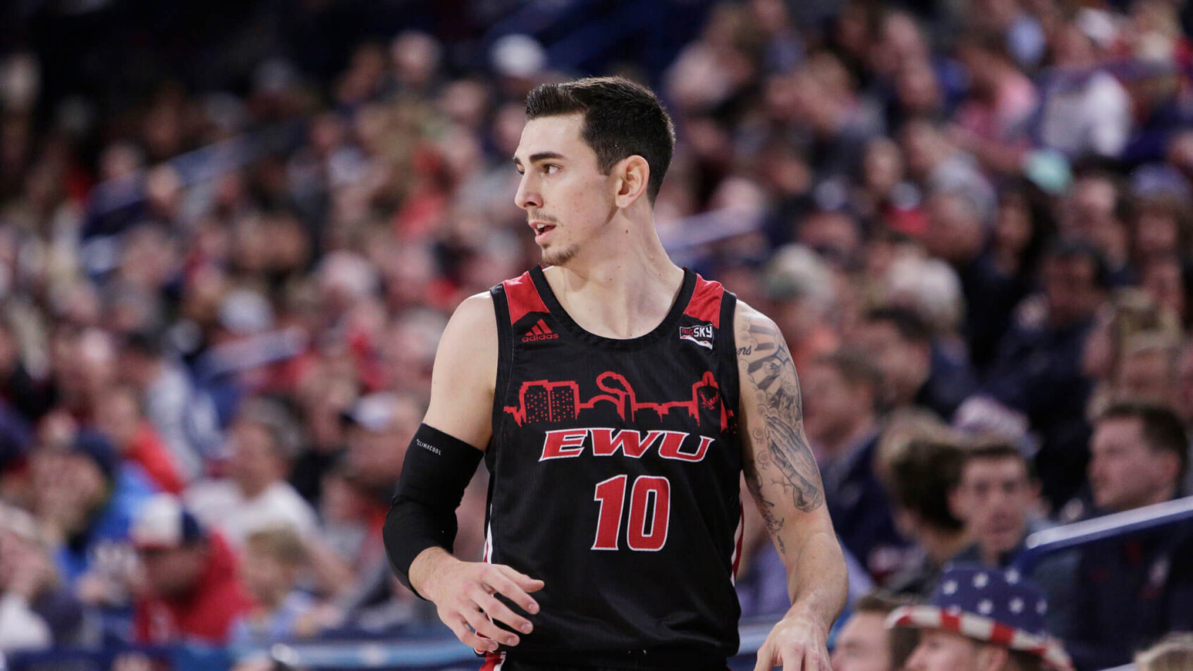 Eastern Washington guard Jacob Davison walks on the court
