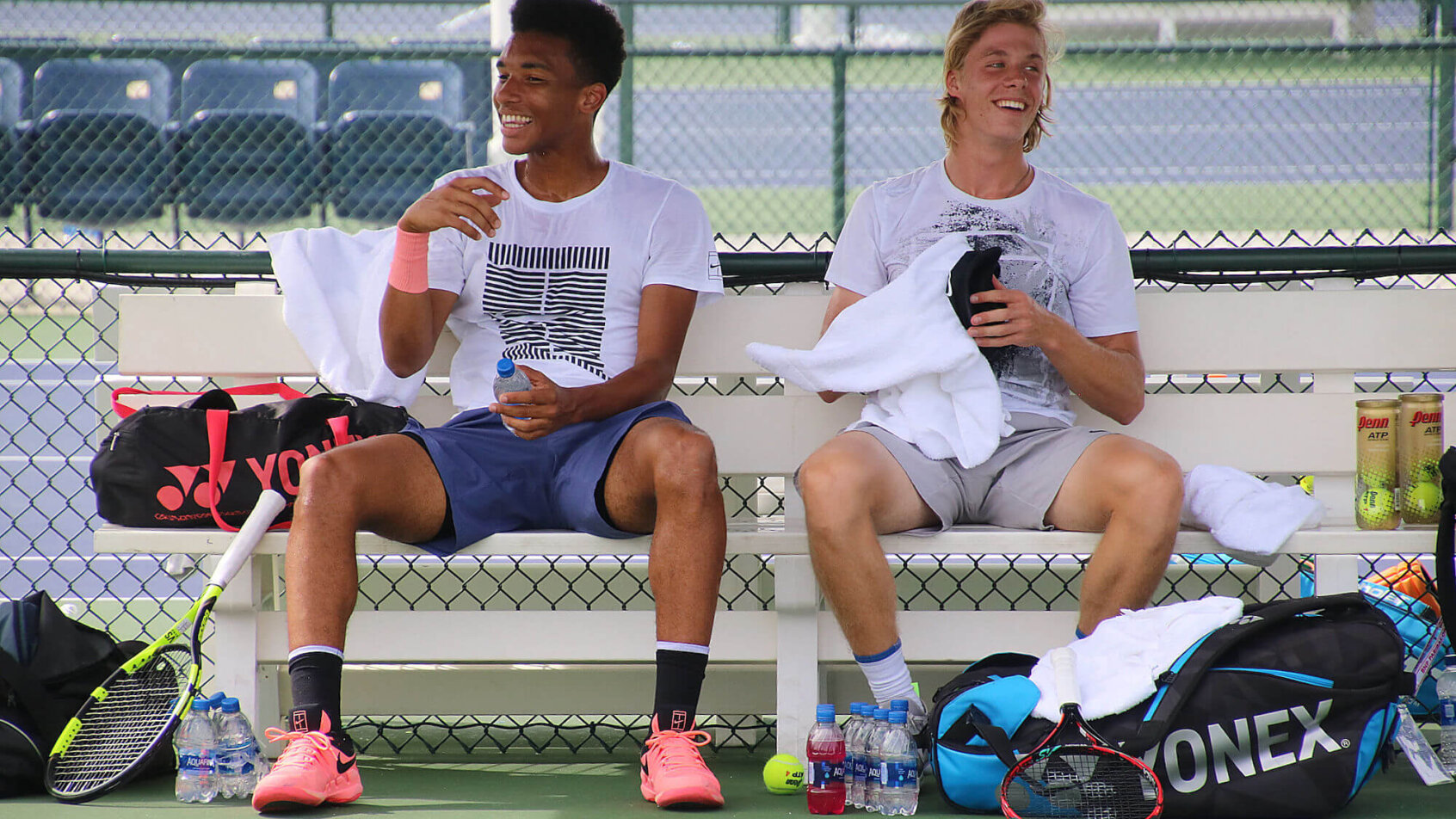 Felix Auger-Aliassime and Denis Shapovalov sitting beside each other
