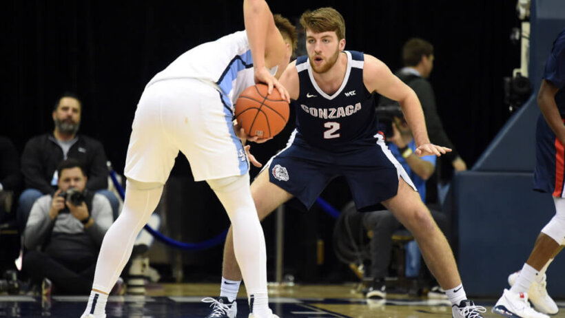 Gonzaga's Drew Timme guarding an opponent