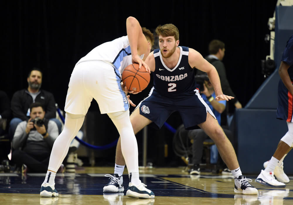 Gonzaga's Drew Timme guarding an opponent
