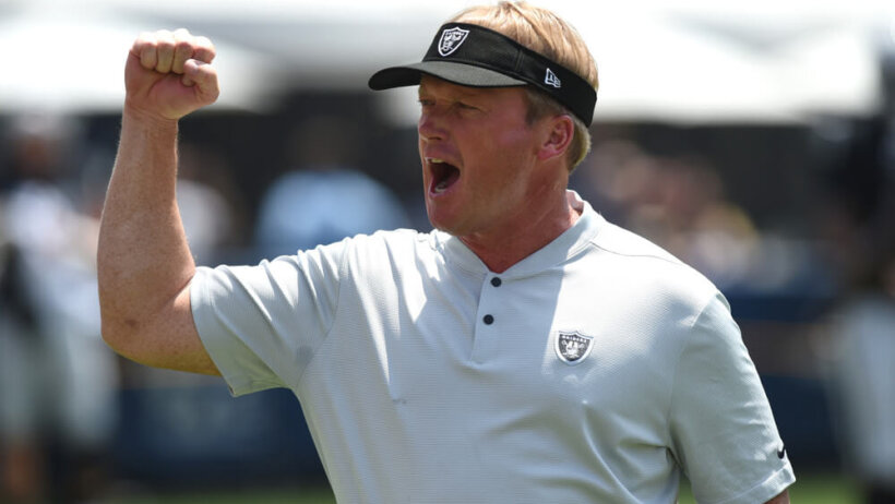 Jon Gruden pumping his fist
