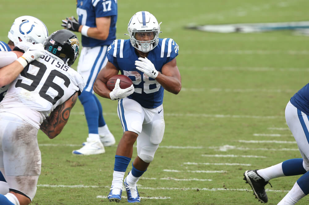 Colts Running Back Jonathan Taylor runs the ball