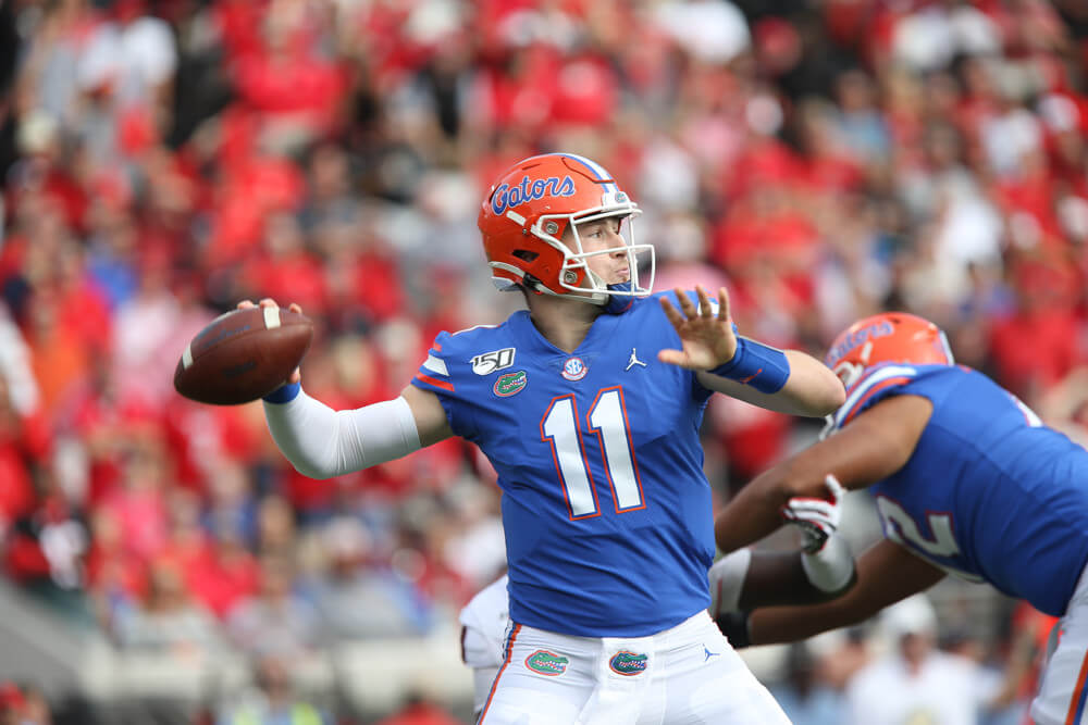 Kyle Trask throwing