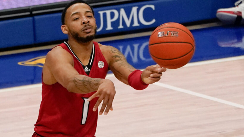 Louisville's Carlik Jones plays against Pittsburgh during an NCAA college basketball game