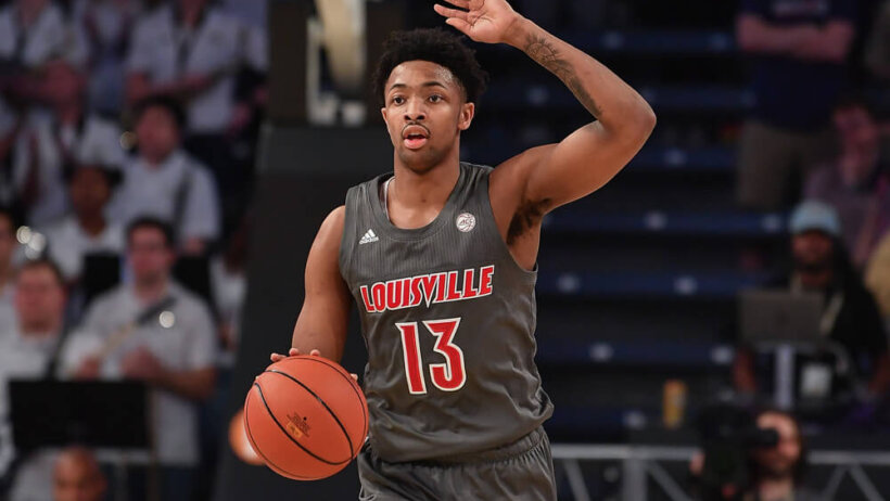 Louisville's David Johnson dribbling the ball up the court
