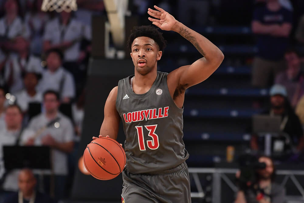 Louisville's David Johnson dribbling the ball up the court