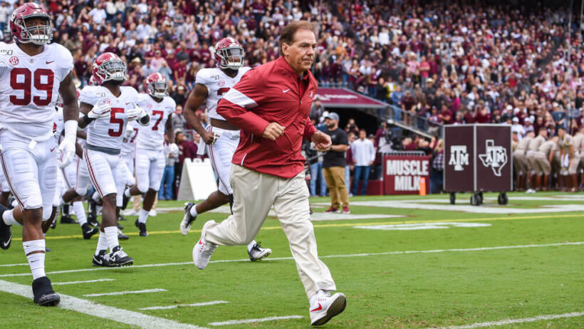 Nick Saban jogging