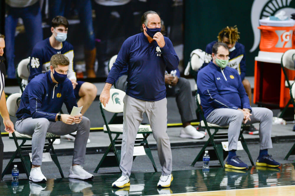Notre Dame Fighting Irish head coach Mike Brey paces the sideline