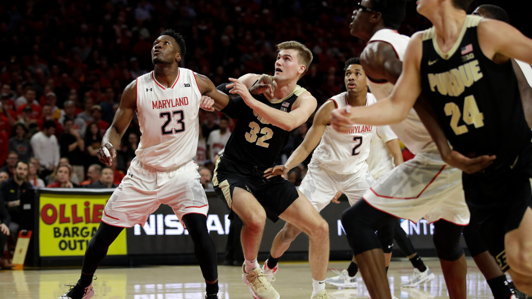 Maryland forward Bruno Fernando battling Purdue's Matt Haarms for a rebound