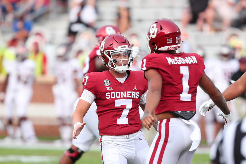 Oklahoma Sooners QB Spencer Rattler (7) celebrates with RB Seth McGowan