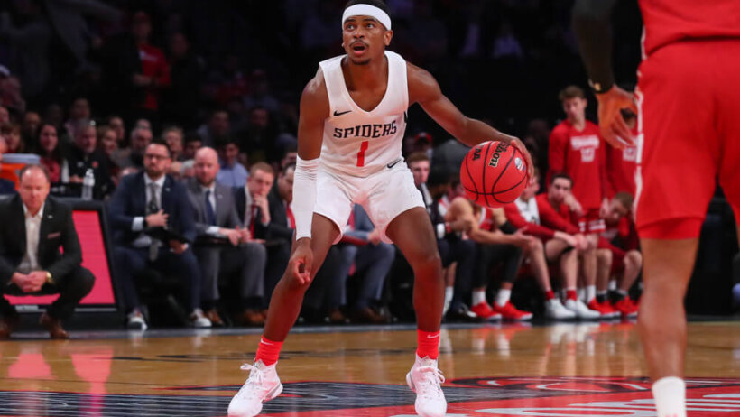 Richmond Spiders guard Blake Francis dribbling